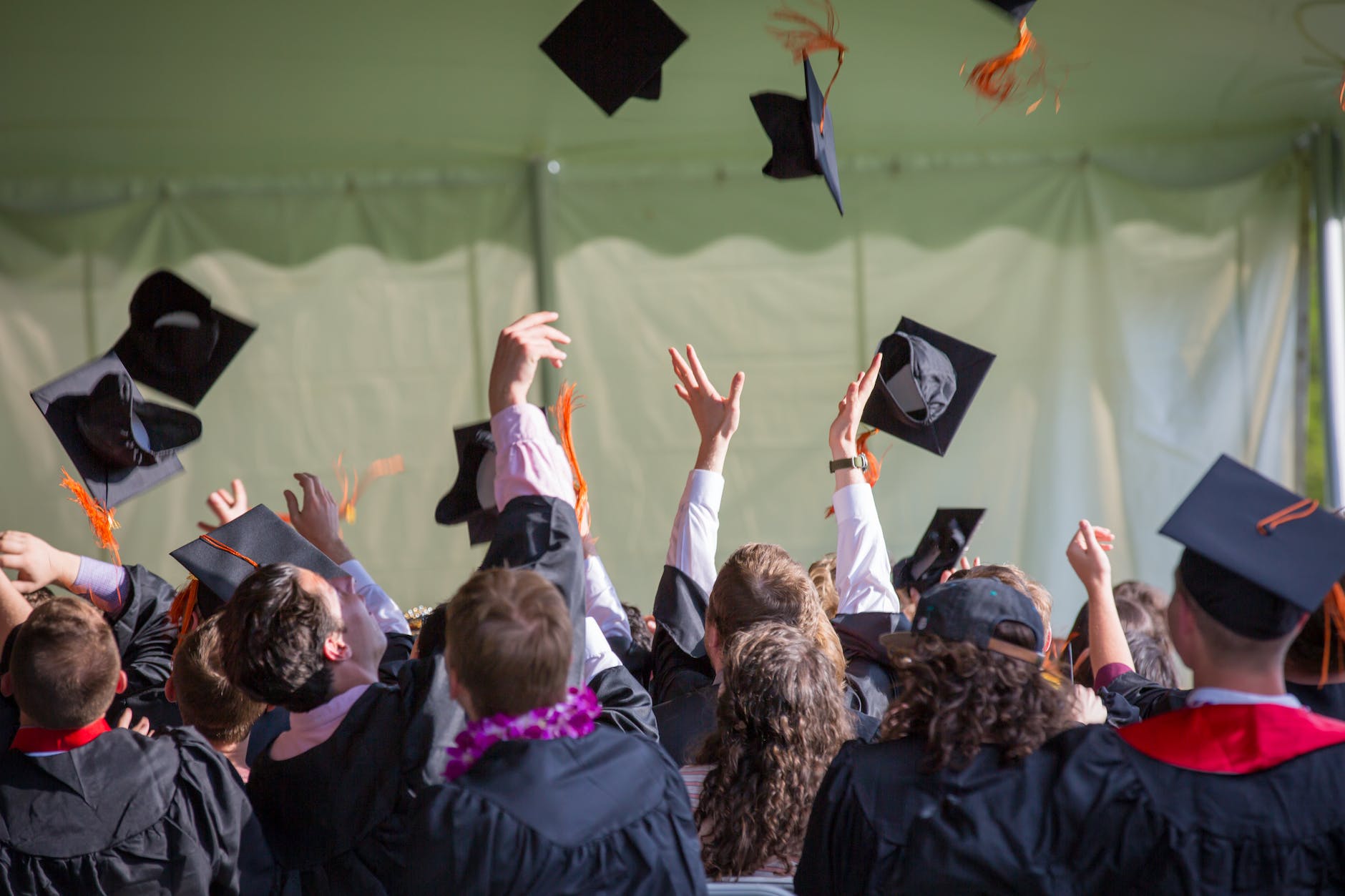 photography of people graduating in tech