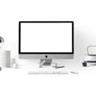 silver imac near white ceramic kettle
