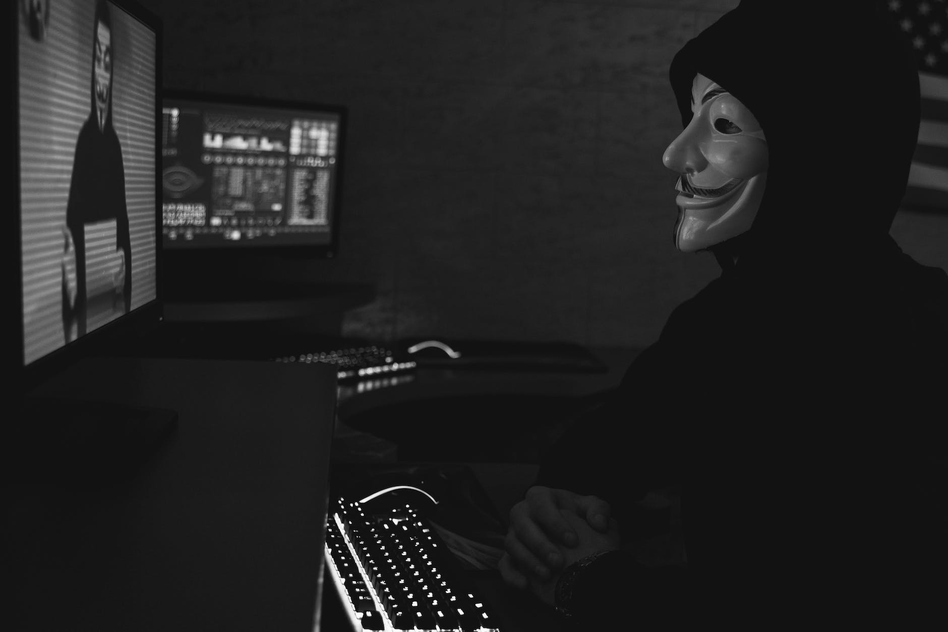 monochrome photo of two people having a video call