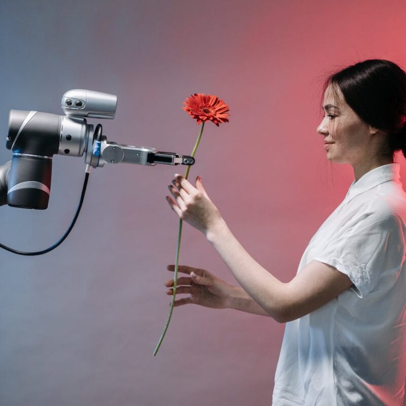 a robot holding a flower