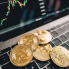 gold coins on the laptop